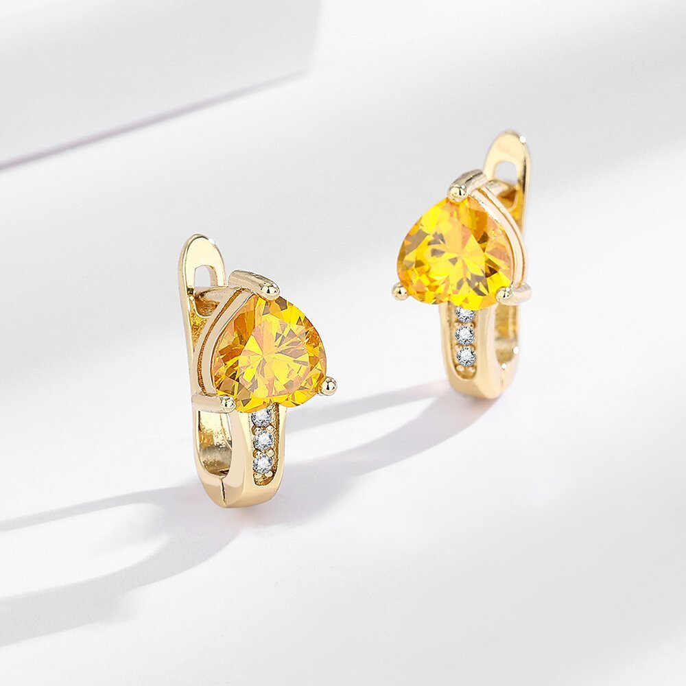 Opulent Heart Glow Ear Clips