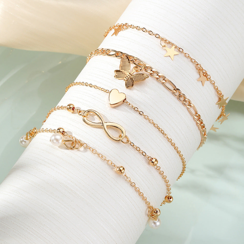 Butterfly, Pearl & Heart Anklet Set – 4-Piece Multi-Layer Design