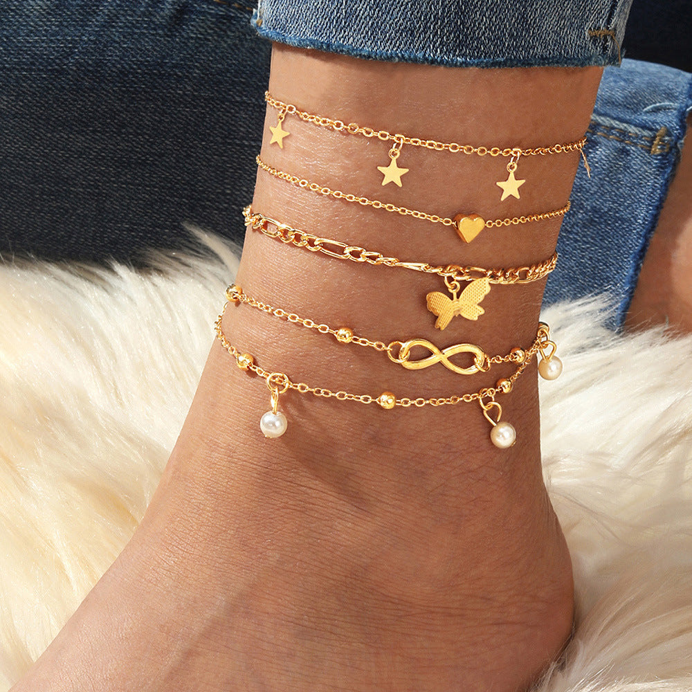 Butterfly, Pearl & Heart Anklet Set – 4-Piece Multi-Layer Design